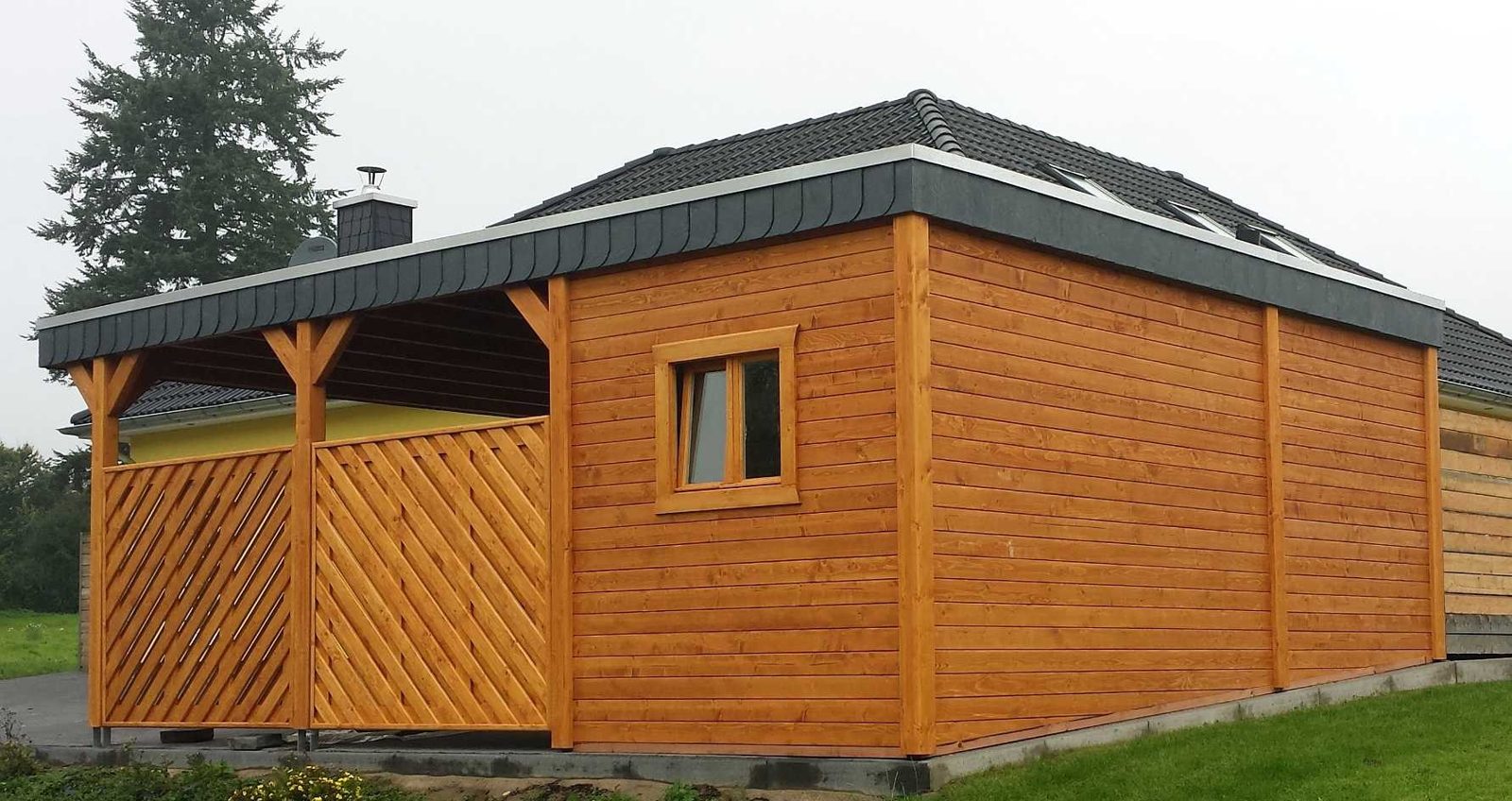 Timber carport with store room built by our team