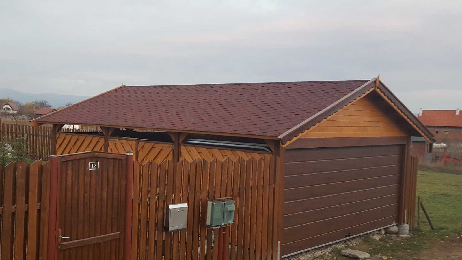 Timber garage with gate